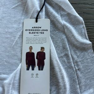 Sheer long sleeve yoga shirt.  Never worn with tags!